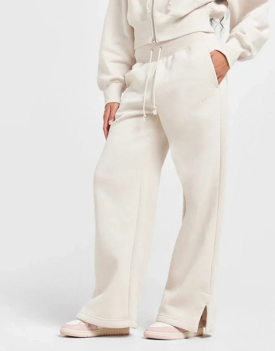Pantalones deportivos Nike de pierna ancha para mujer